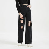 Jean taille haute déchiré et pantalon droit